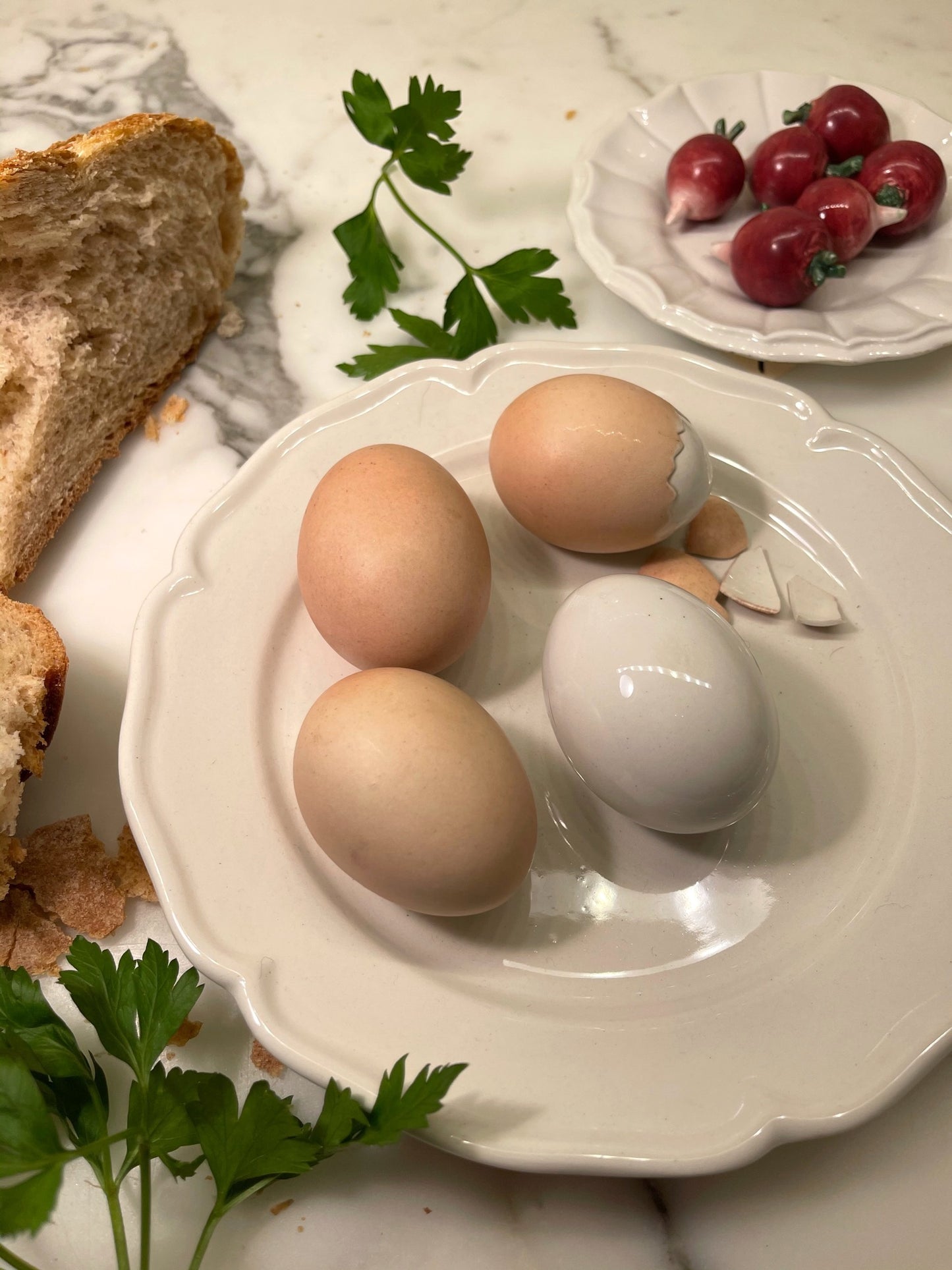 Porcelain Eggs on a Fluted Plate