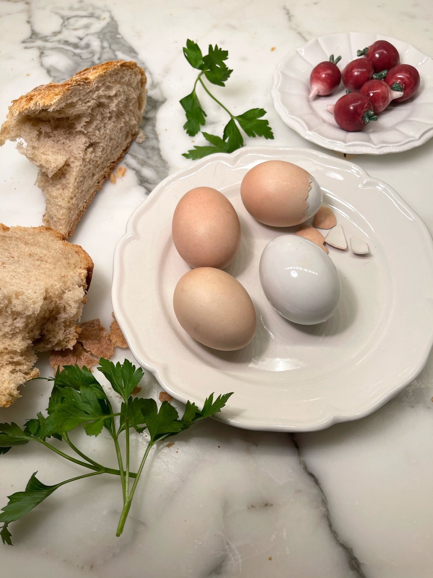 Porcelain Eggs on a Fluted Plate